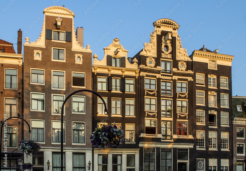 Obraz premium Traditional old buildings in Amsterdam