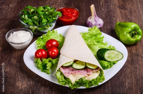 Burito with ham, cheese and cucumber