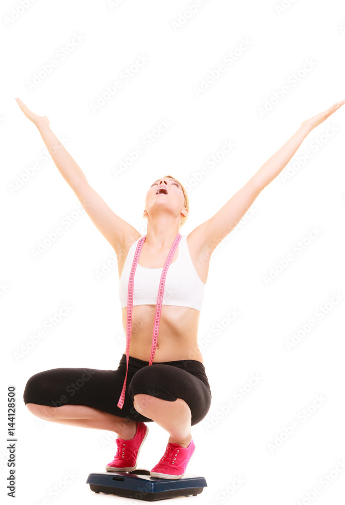 Disappointed woman on weighing scale. Slimming. Disappointed woman on weighing scale. Slimming.