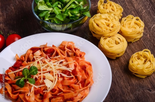 Vegetable paste. Tagliatelle with tomatoes