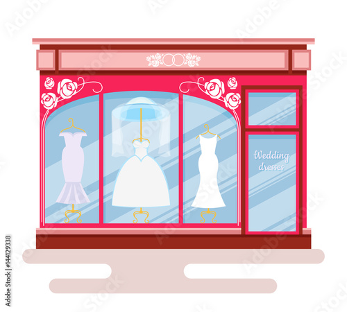 Shop for wedding dresses. Style building flat with the dresses in the window