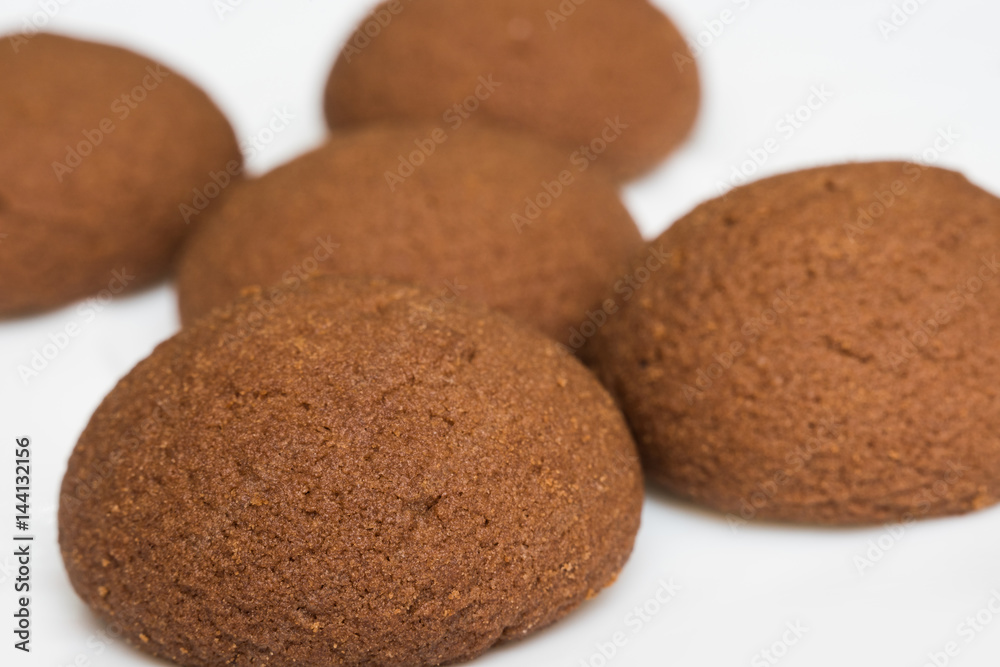 Chocolate cookie on the side close - selective focus Chocolate cookie on the side close - selective focus