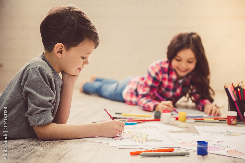 Children drawing at home Children drawing at home