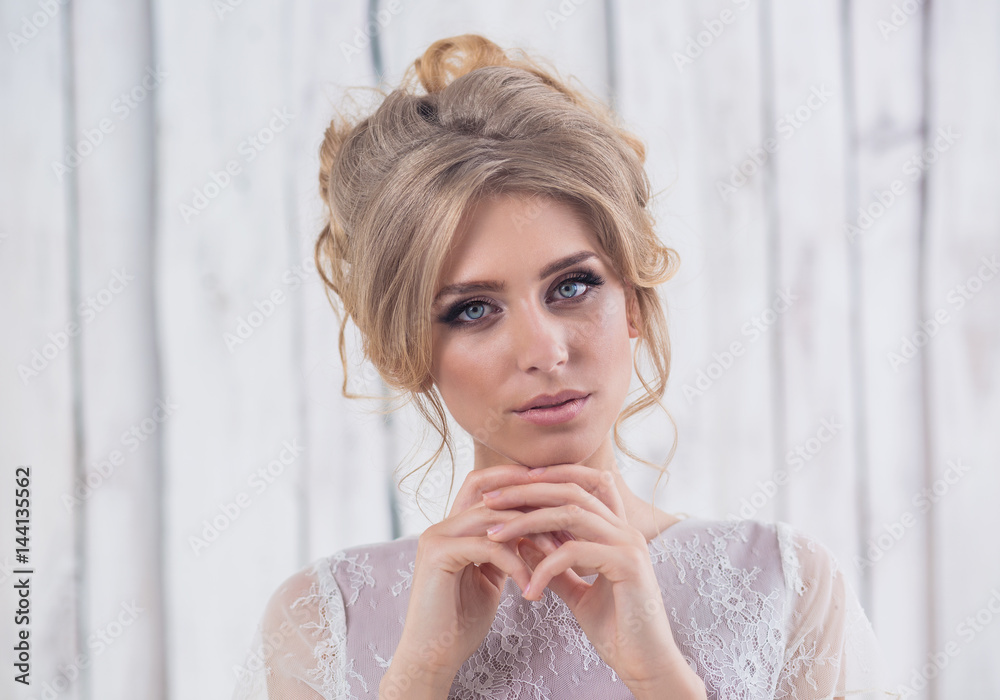 Beautiful young bride with hair and makeup Beautiful young bride with hair and makeup