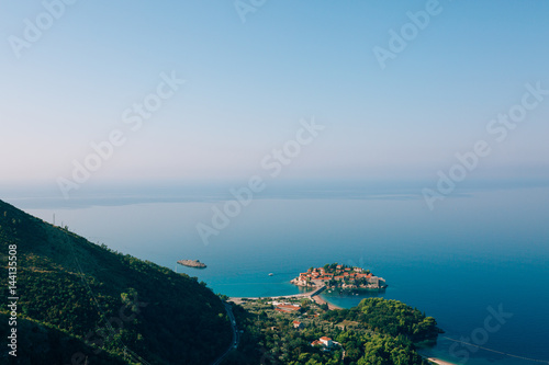 Fototapeta Naklejka Na Ścianę i Meble -  Sveti Stefan, view from the mountain. Montenegro, the Adriatic Sea, the Balkans