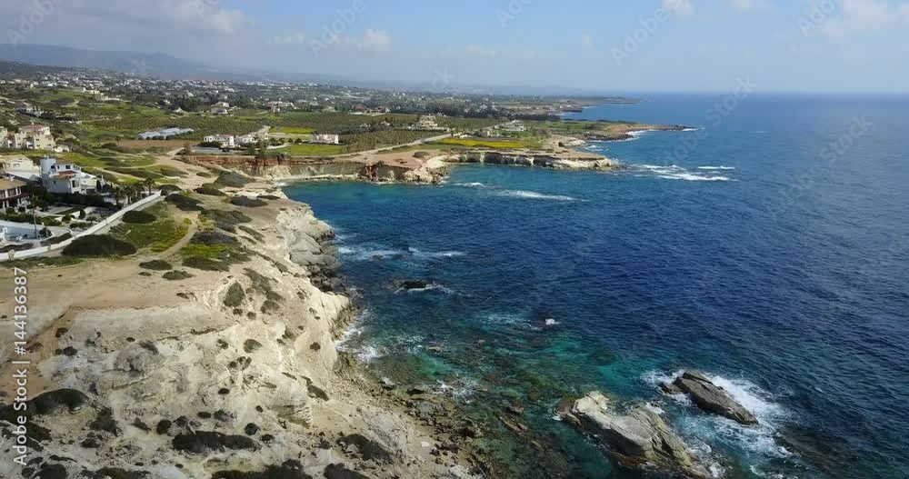flying over the island. Landscape. Mediterranean Sea and the coast. Cyprus. City resort. Drone Point of View. Blue lagoon with rocks and stones. Mountains,Sea,paradise. flying over the island. Landscape. Mediterranean Sea and the coast. Cyprus. City resort. Drone Point of View. Blue lagoon with rocks and stones. Mountains,Sea,paradise.