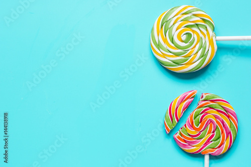 Closeup of candy on blue table background top view mockup