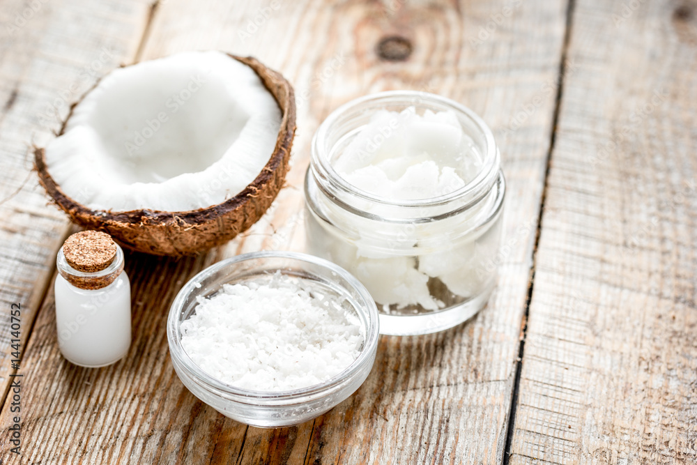 cosmetic concept with fresh coconuts on old wooden table background cosmetic concept with fresh coconuts on old wooden table background