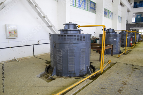 Engines of water pumps at a water pumping station. Pumping irrig photo