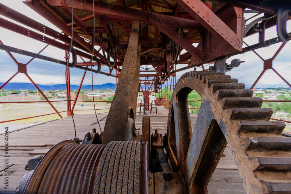 Gear with steel cable in old iron structure Gear with steel cable in old iron structure