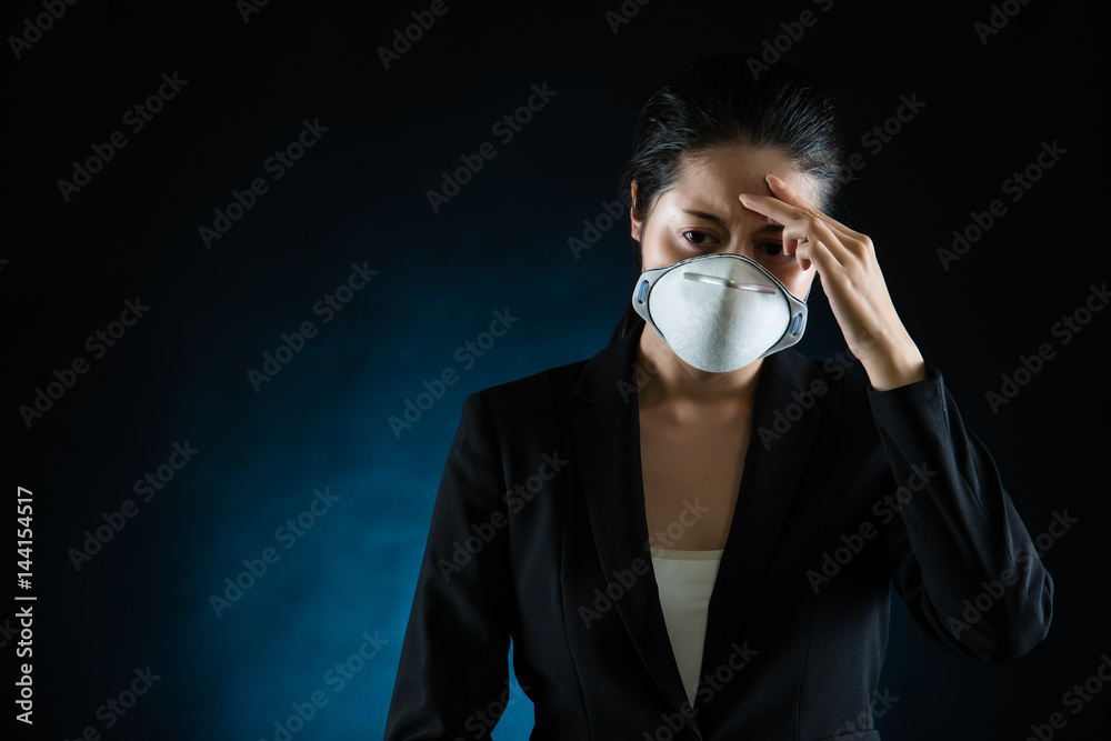 headache woman feel unwell wearing a face mask headache woman feel unwell wearing a face mask