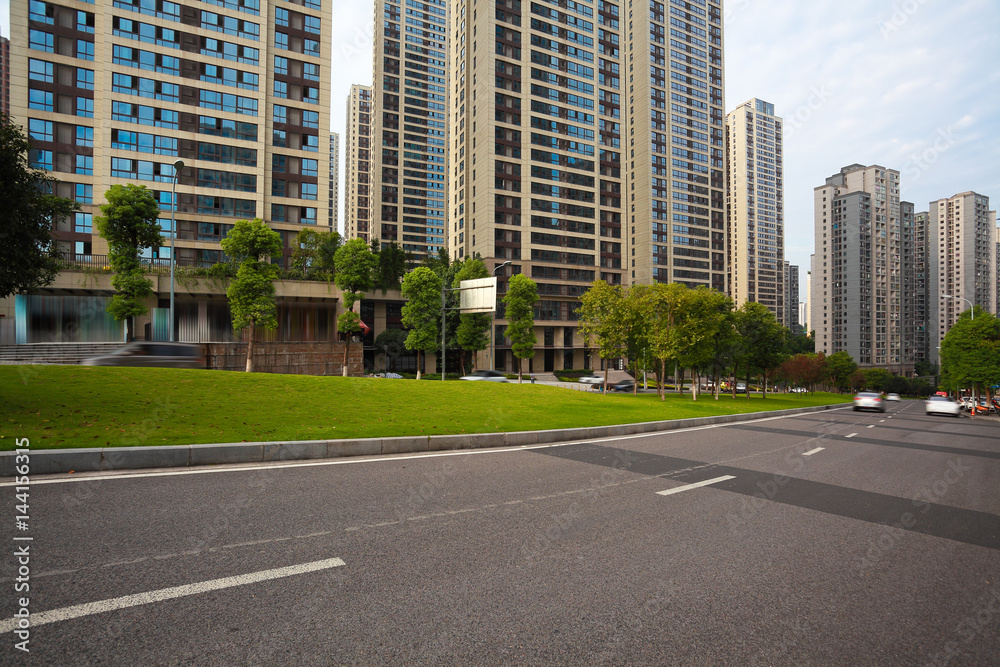 Empty road surface floor with City streetscape buildings