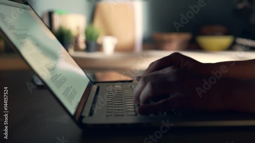 Close up of woman using laptop