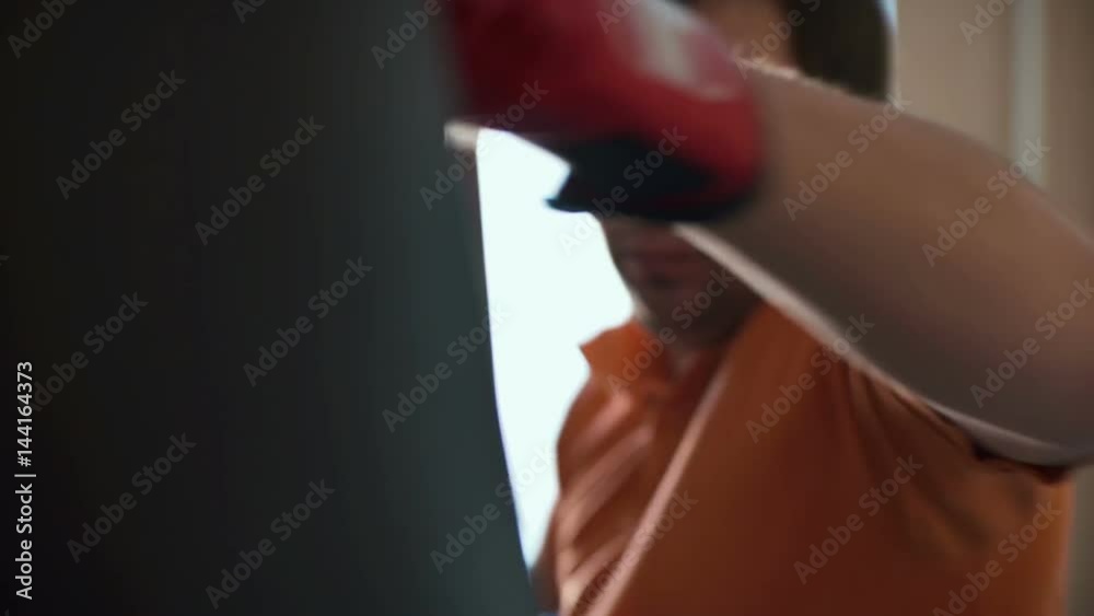 Boxer hits the pear in training. Dynamic frame Boxer hits the pear in training. Dynamic frame