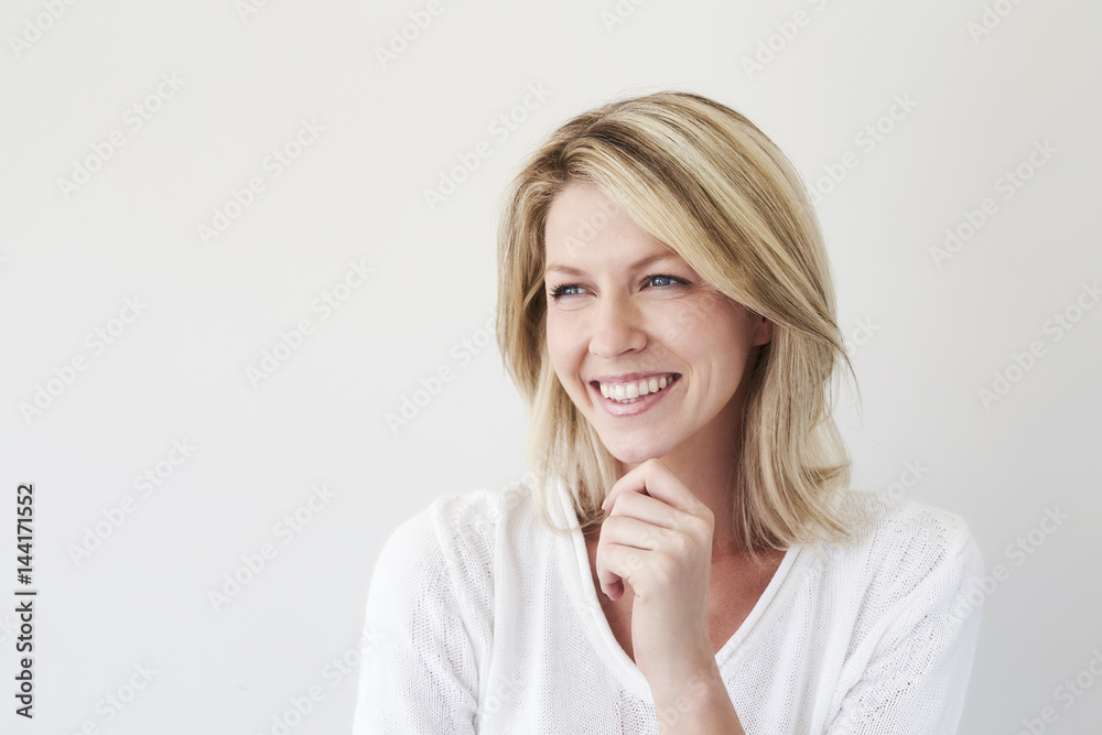 Beautiful laughing lady in white studio Beautiful laughing lady in white studio