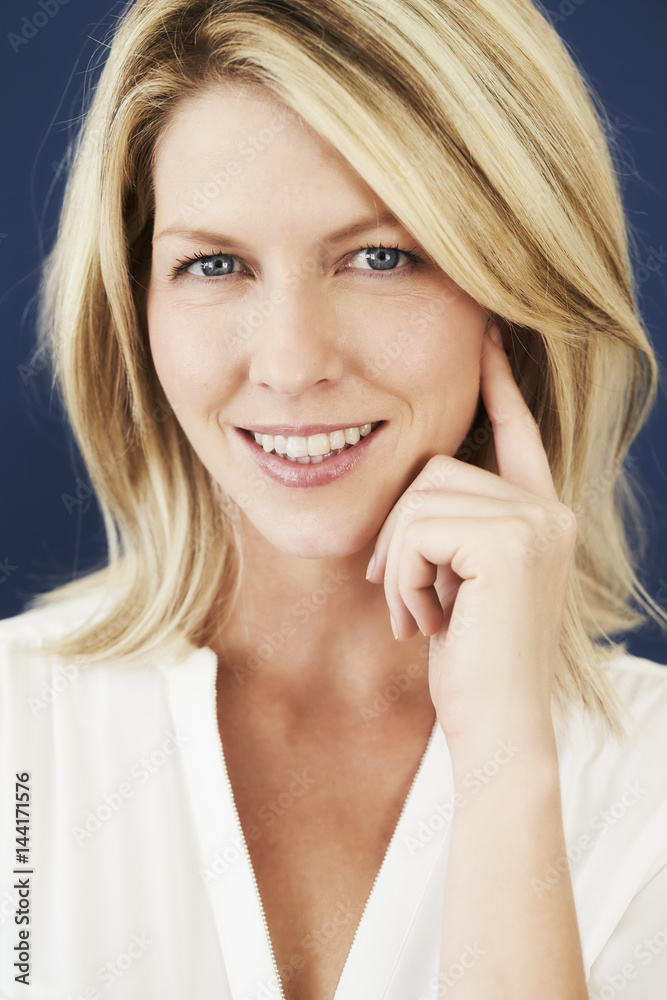Confident blond woman looking at camera Confident blond woman looking at camera