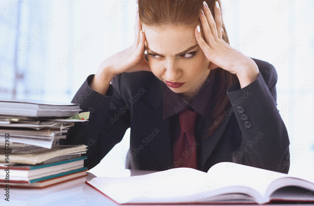 Businesswoman in problems. Alone working in office with a lot of documents. Yelling and screaming for bad results. (psychological portrait, aggression, anger, frustration) Businesswoman in problems. Alone working in office with a lot of documents. Yelling and screaming for bad results. (psychological portrait, aggression, anger, frustration)