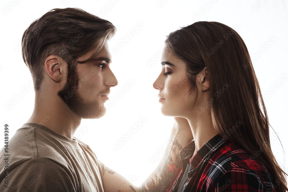 Tender portrait of man and woman facing each other. Tender portrait of man and woman facing each other.