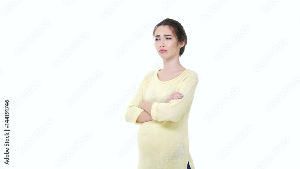Pregnant crying young woman having bad stomach ache isolated on white background Pregnant crying young woman having bad stomach ache isolated on white background