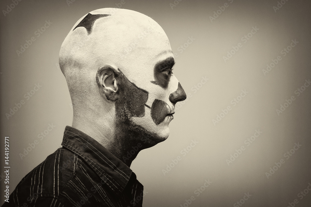 Naklejka premium Beautiful man with creative make-up for the Halloween party