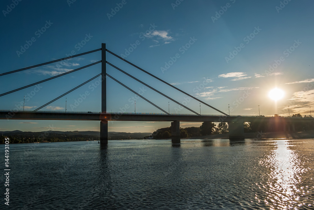Fototapeta premium Brige of Liberty crossing the Dunabe river in Novi Sad, Vojvodina, Serbia, view from the river, under the bridge