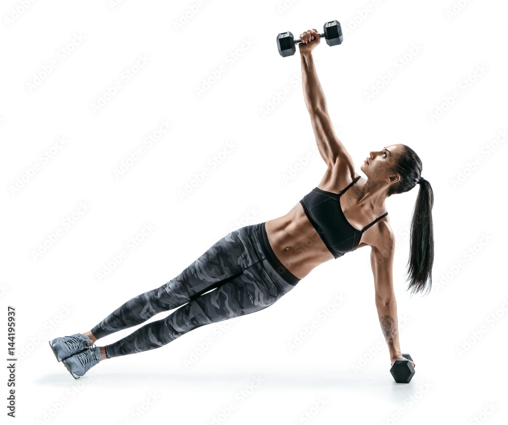 A woman is holding a dumbbell and posing for a picture Image & Design ID  0000230079 - SmileTemplates.com