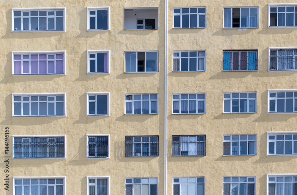 windows of a multistory building as background
