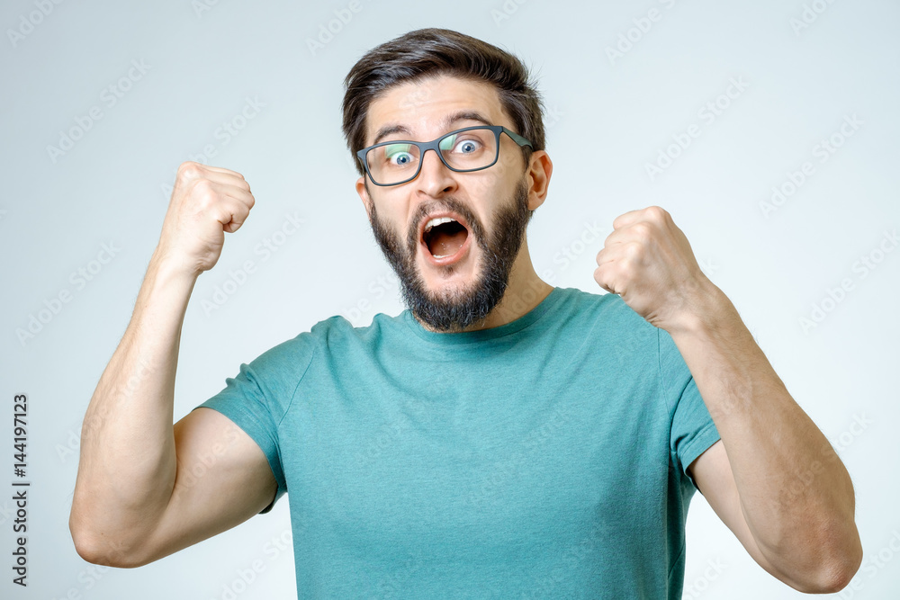 Young man and sign of victory Young man and sign of victory