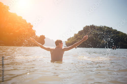 Photo of man in sea