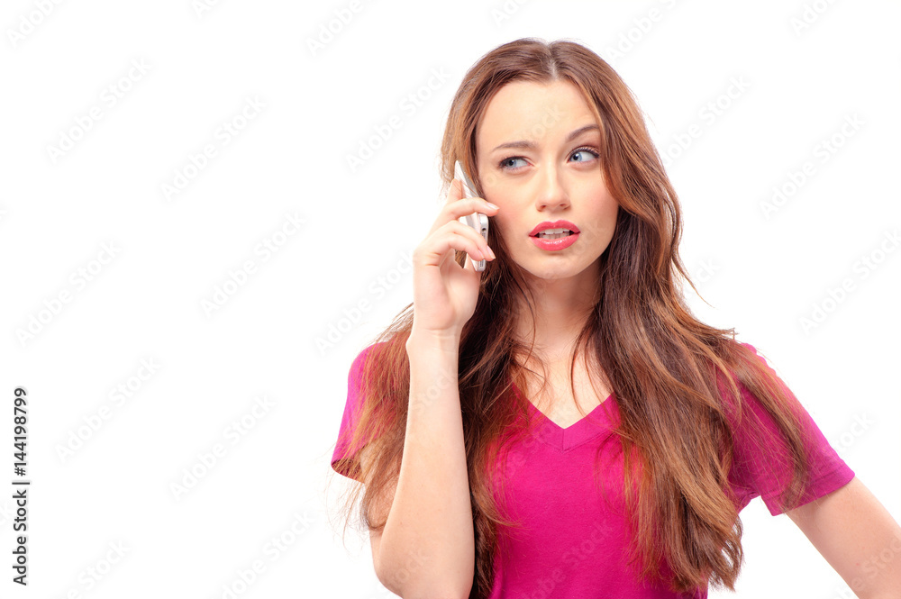 confused young lady on purple t-shirt talking on her phone confused young lady on purple t-shirt talking on her phone