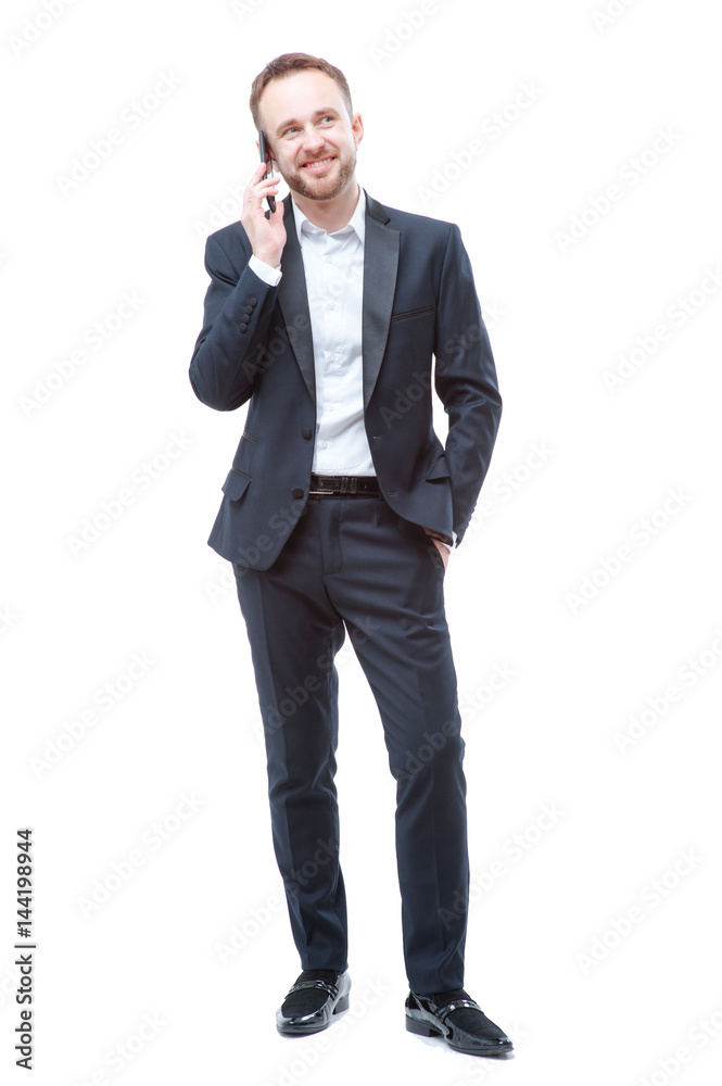 Young man in suit using smart phone Young man in suit using smart phone