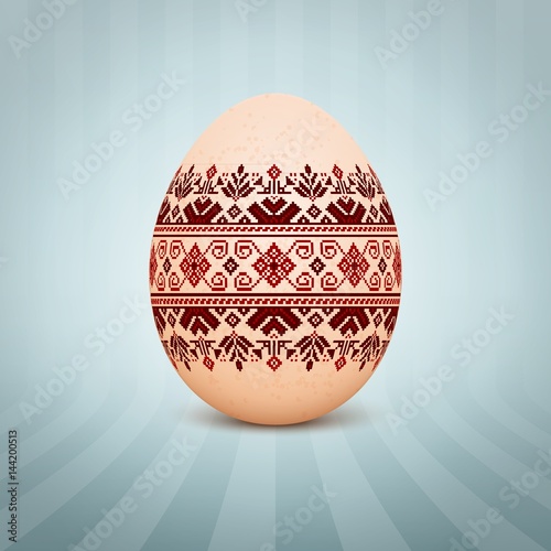 The Easter egg with an Ukrainian folk pattern ornament. Isolated vector realistic yellow egg.