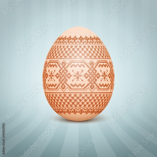The Easter egg with an Ukrainian folk pattern ornament. Isolated vector realistic yellow egg.