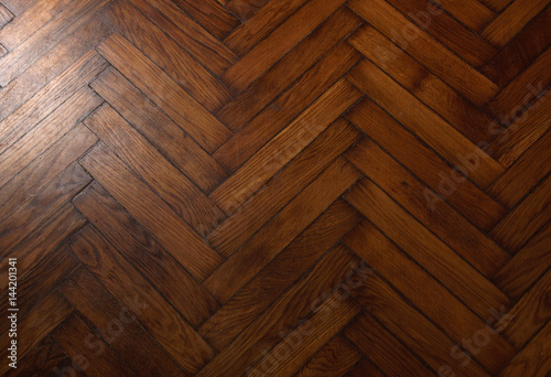 Background in the form of a wooden floor with a pattern of French fir