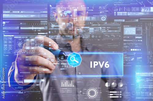 Business, Technology, Internet and network concept. Young businessman working on a virtual screen of the future and sees the inscription: IPv6