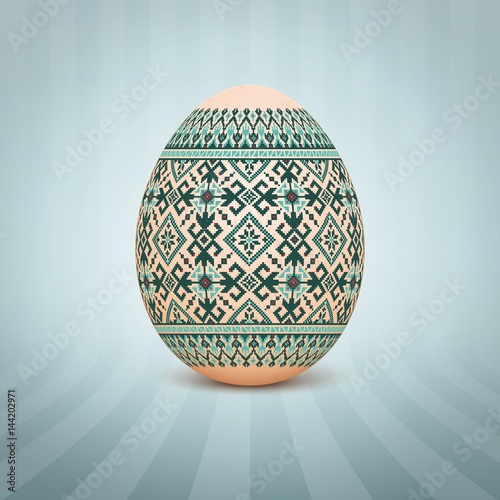 The Easter egg with an Ukrainian folk pattern ornament. Isolated vector realistic yellow egg.
