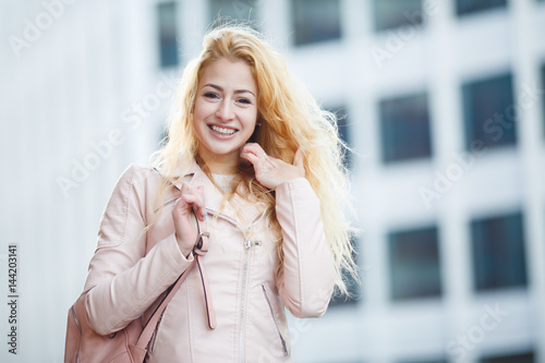 Happy girl on blurred background © snedorez
