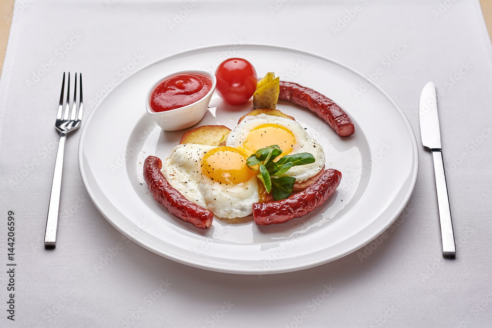Delicious Omurice omelette with ketchup close-up on a plate. Horizontal Delicious Omurice omelette with ketchup close-up on a plate. Horizontal