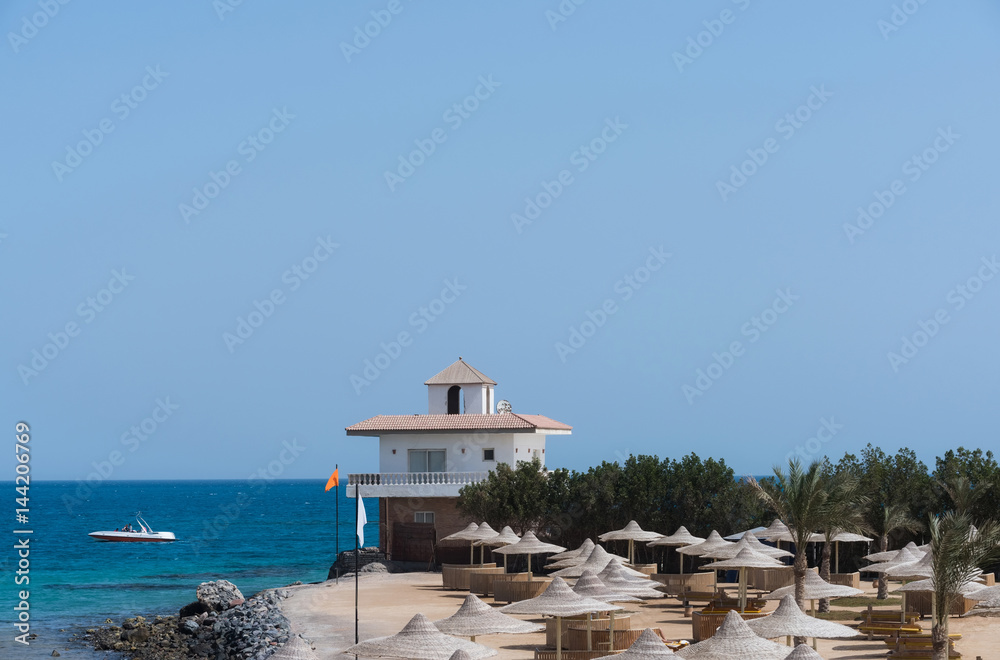 Fototapeta premium Hotel resort place with wicker umbrellas