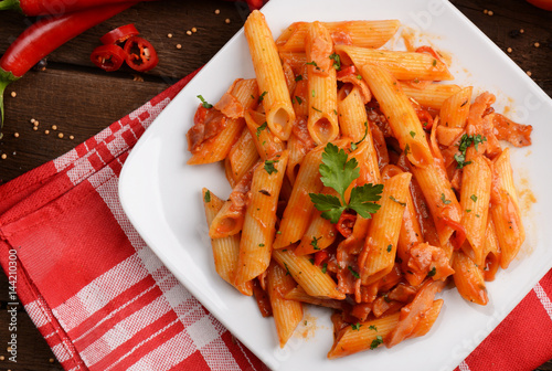 Penne pasta with tomato / arrabiata sauce photo