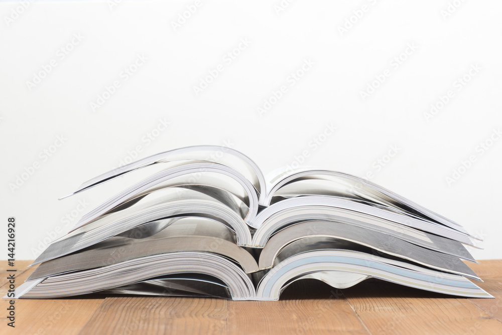 Naklejka premium open book stack on white backgrond
