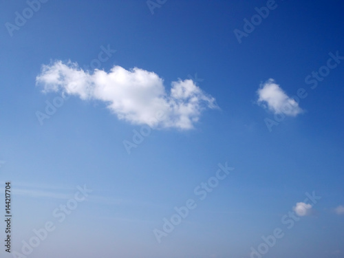 White clouds are floating in blue sky.