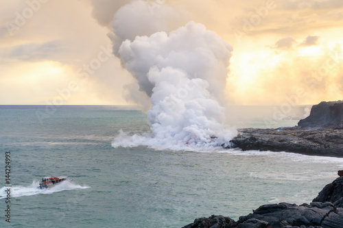 Amazing view of lava pouring into the sea in Volcanoes National Park, Big Island, Hawaii