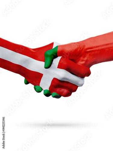 Flags Denmark, Portugal countries, partnership friendship handshake concept.