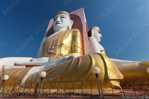 Bago, Myanmar Four Faces of Buddha at Kyaikpun Buddha. photo