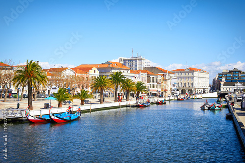 Traditional boats on the canal in Aveiro, photo