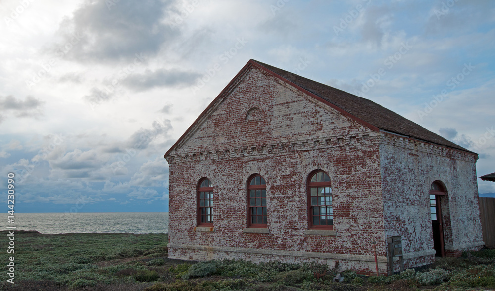 Red Brick Fog Signal Building at Piedras Blancas Lighthouse point on the Central Coast of California USA