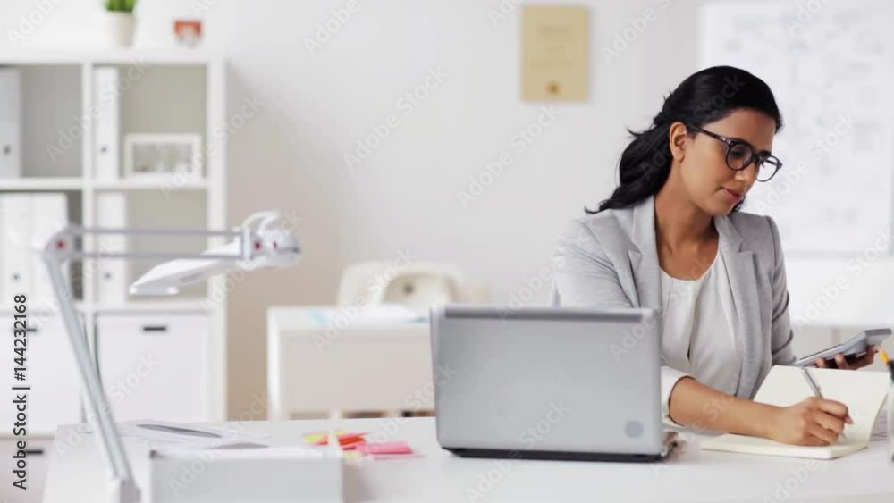 businesswoman with calculator counting at office businesswoman with calculator counting at office