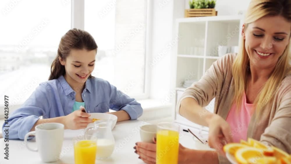 happy family having breakfast at home kitchen happy family having breakfast at home kitchen