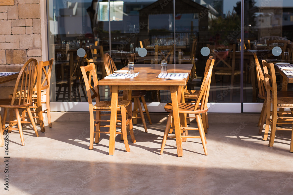 Street cafe. Cozy outdoor restaurant Street cafe. Cozy outdoor restaurant
